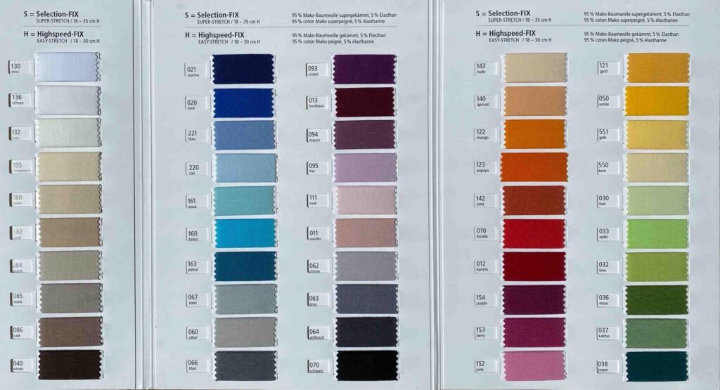 Die Tamara-R Topper Fixleintuch Selection-FIX Stofffarbkarte enthält drei Spalten mit rechteckigen Mustern in Weiß, Blau, Grau, Rosa, Rot, Orange, Gelb und Grün - jeder Farbton ist nummeriert und eindeutig beschriftet.