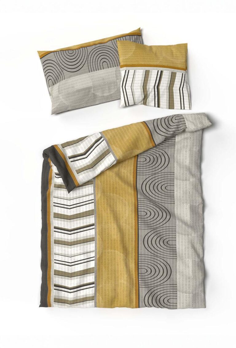Das Set Bettwäsche Lotus Rainald besteht aus einem Kissen- und einem Bettbezug mit geometrischen Mustern - Streifen, Kreise und Wellenlinien - in Senfgelb, Grau, Weiß und Schwarz auf weißem Hintergrund.