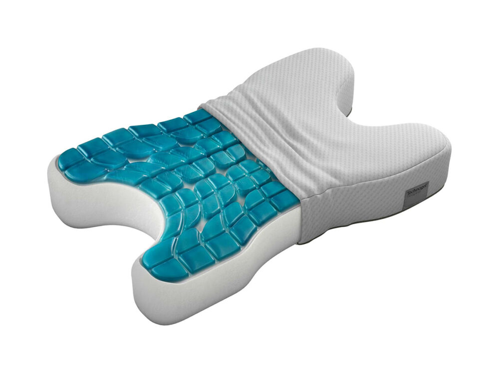 Das Technogel Kissen CPAP ist ein konturiertes weißes Memory Foam-Kissen mit einer blauen kühlenden Gelschicht, das für eine ergonomische Kopf- und Nackenstütze und optimalen Komfort entwickelt wurde - ideal für CPAP-Nutzer.